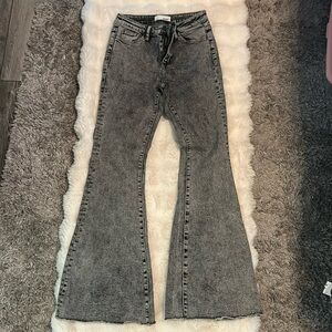 Gray, stonewashed flare jeans. In new condition. Only worn once.